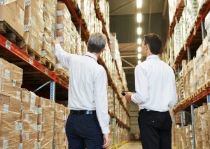 people talking in storeroom