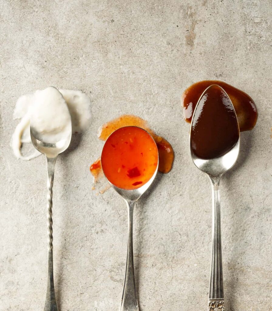 Assorted sauces including mayonnaise, sweet chilli and barbecue sauce.